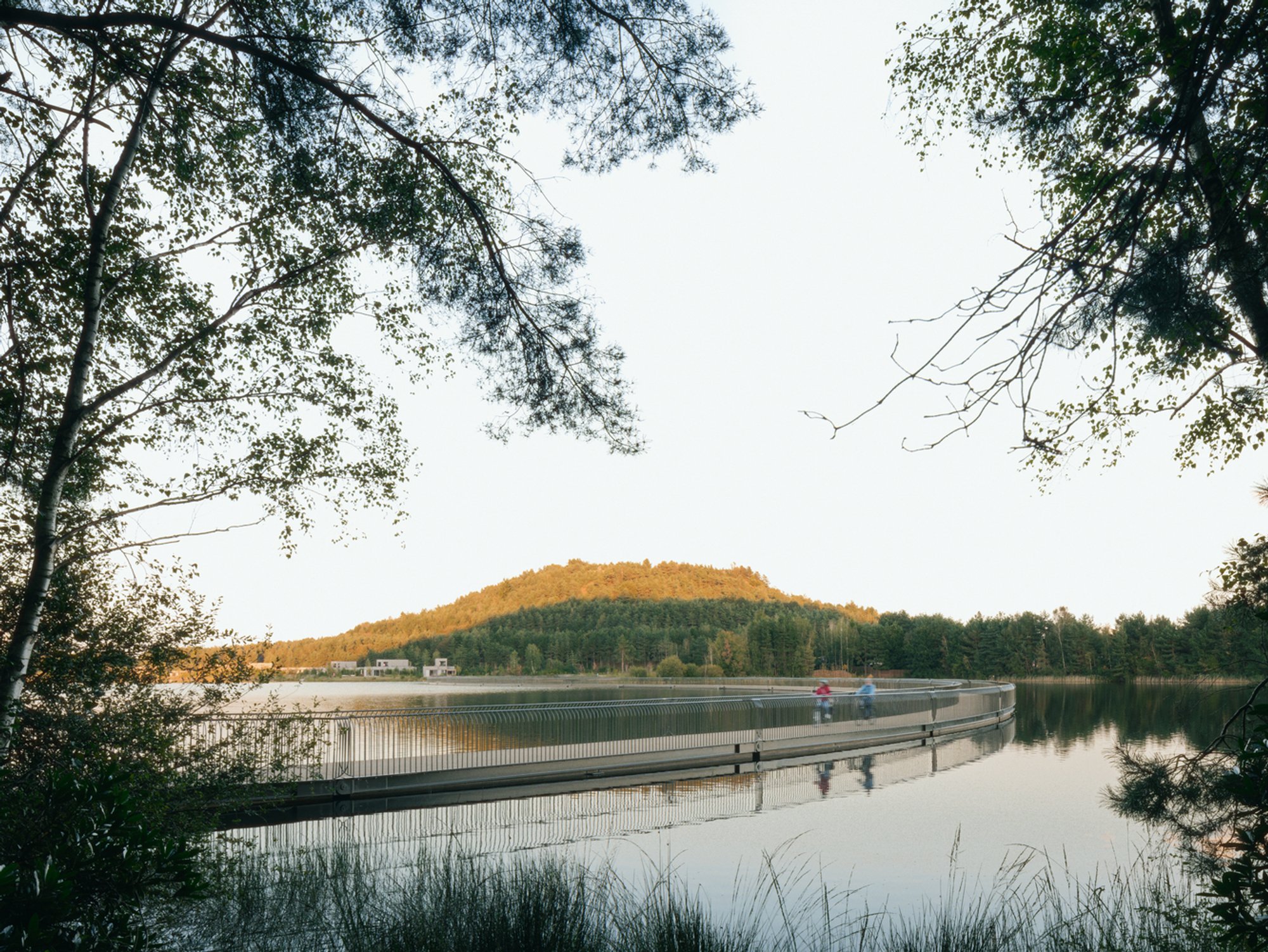 Floating Bicycle Bridge in Belgium: Cycling Between Terrils by Burolandschap