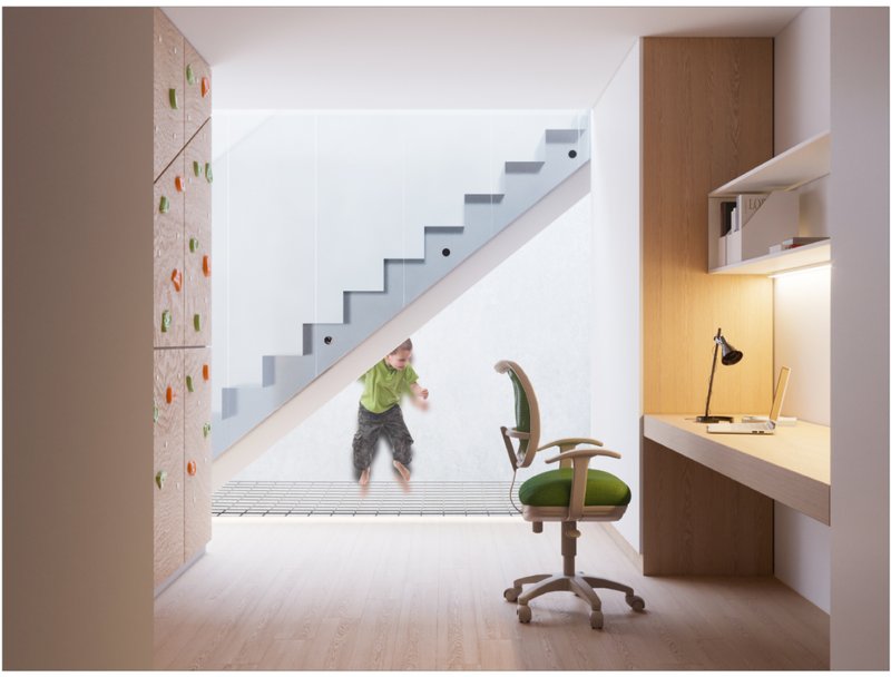 Children's creative play and work area beneath a staircase.