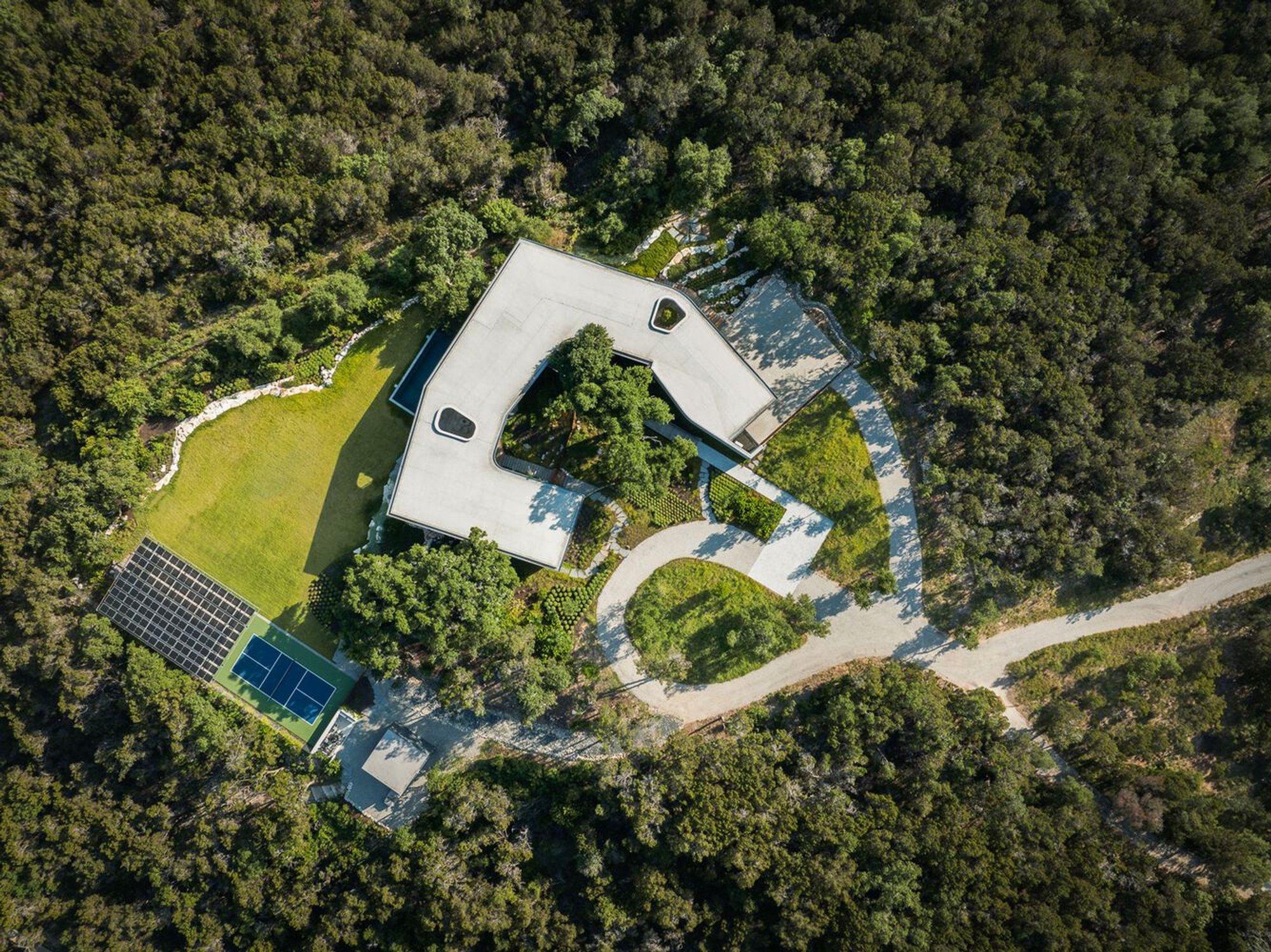 Sustainable Luxury Home Design: City Park Residence by Alterstudio Architecture in Austin