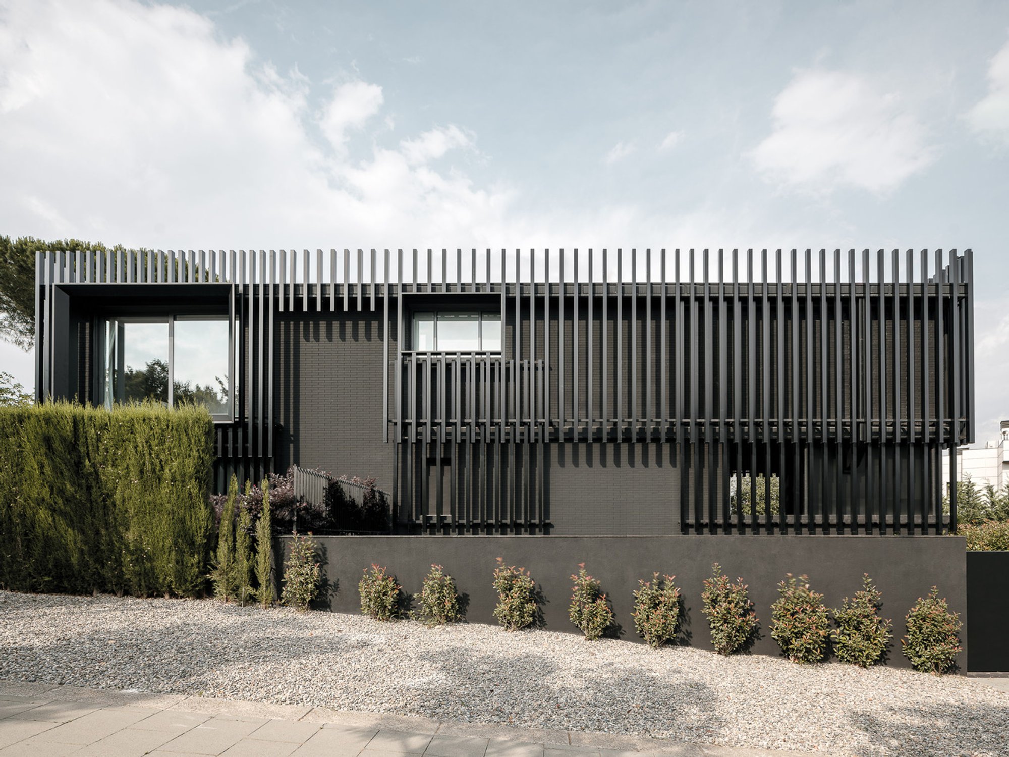 The Black House by MDAMMM + The Black House Studio