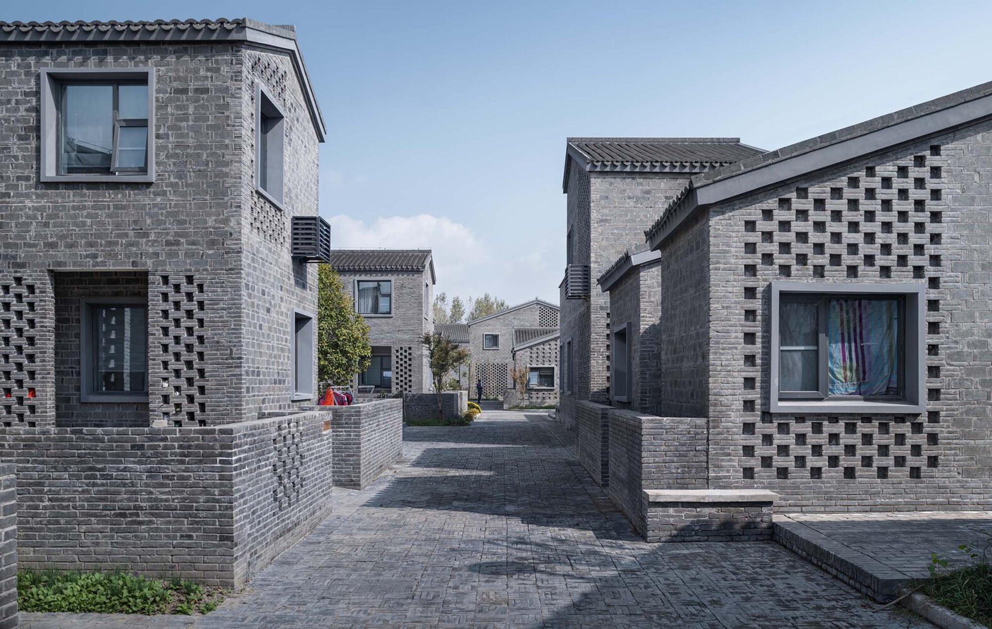 The New Rural Community of Mugou Village by Atelier Zhouling