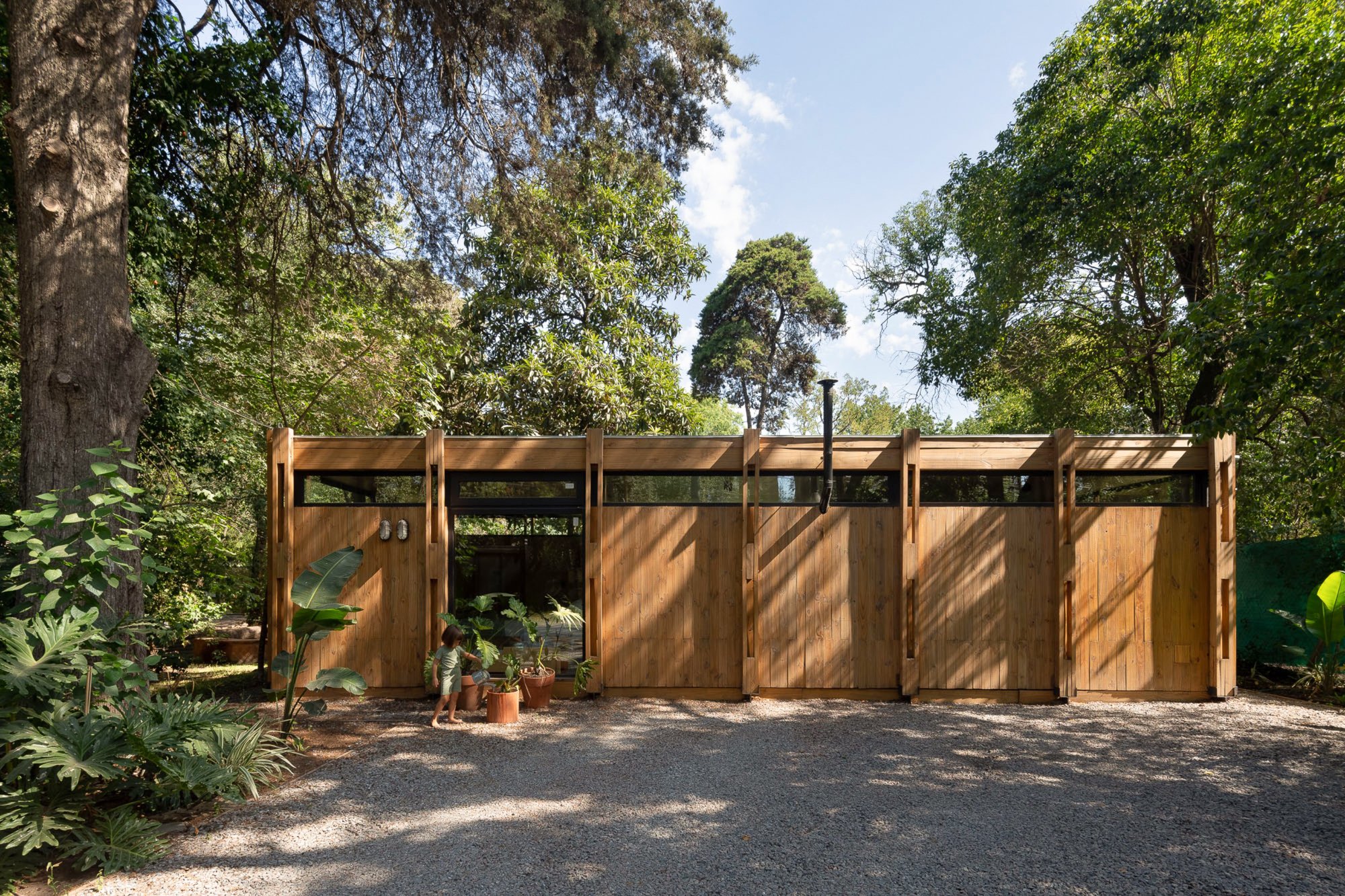 Forest Shelter by Sol Galliano: Minimalist Family Home Amidst Lush Argentine Forests