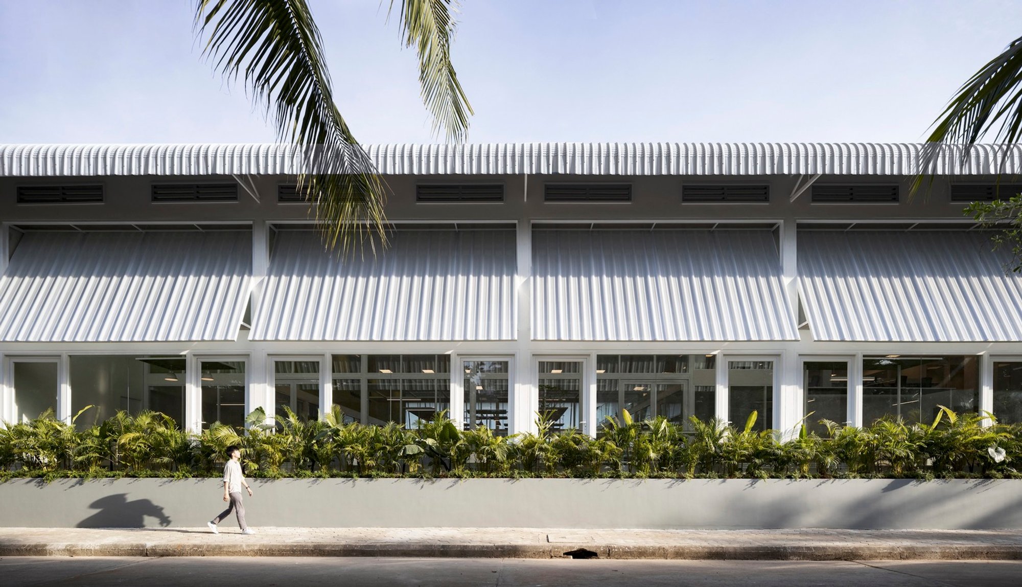 Zuellig Pharma Headquarters by Bloom Architecture: Adaptive Reuse of an Industrial Warehouse in Phnom Penh