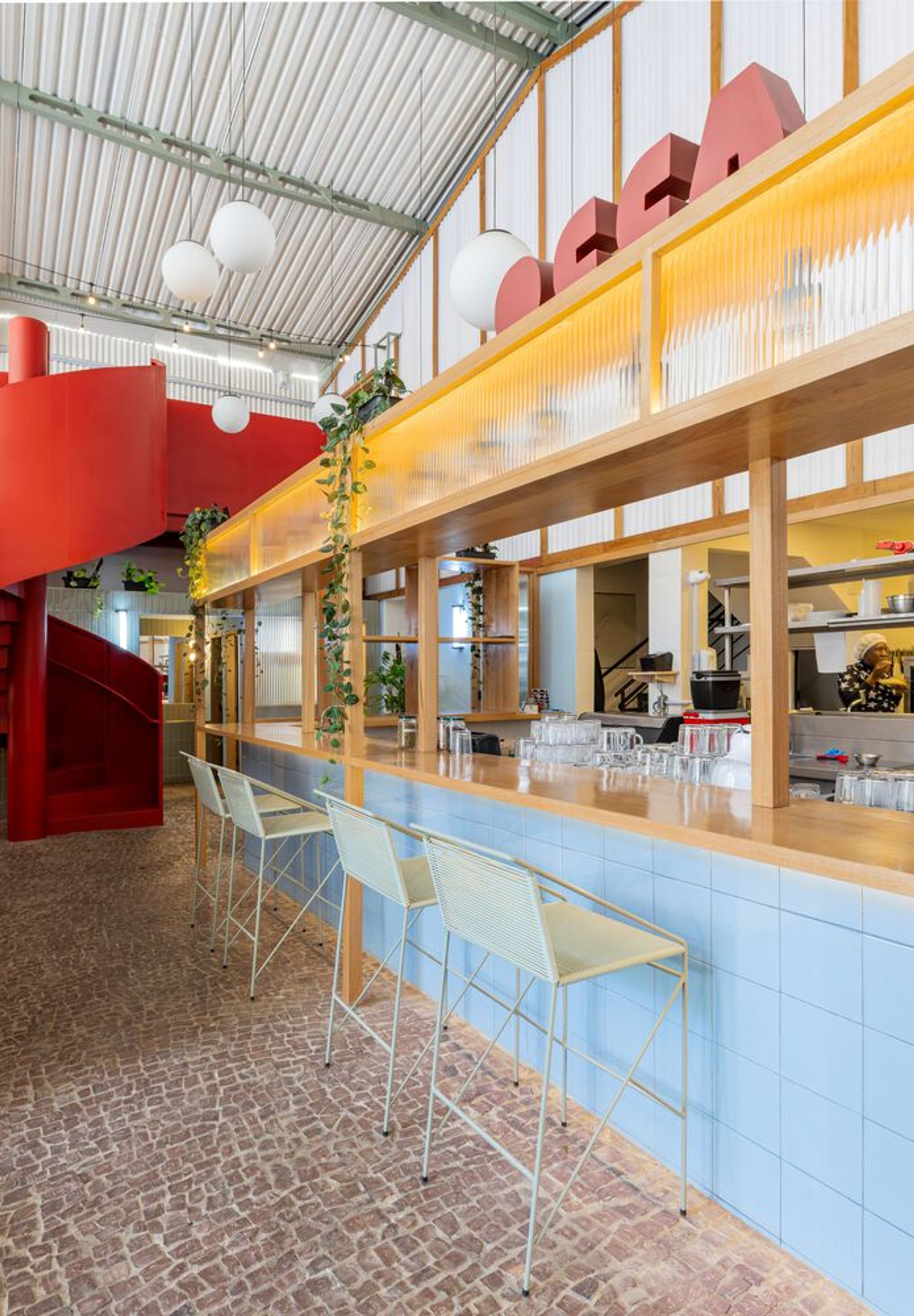 Occa Bar: Transforming an Old Warehouse into a Vibrant Urban Dining Experience in Cataguases
