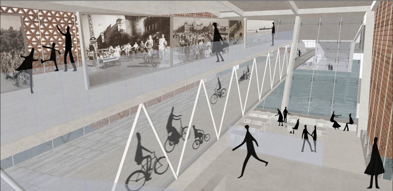 Interior view of the cycling museum where the bridge becomes the main exhibit in motion.