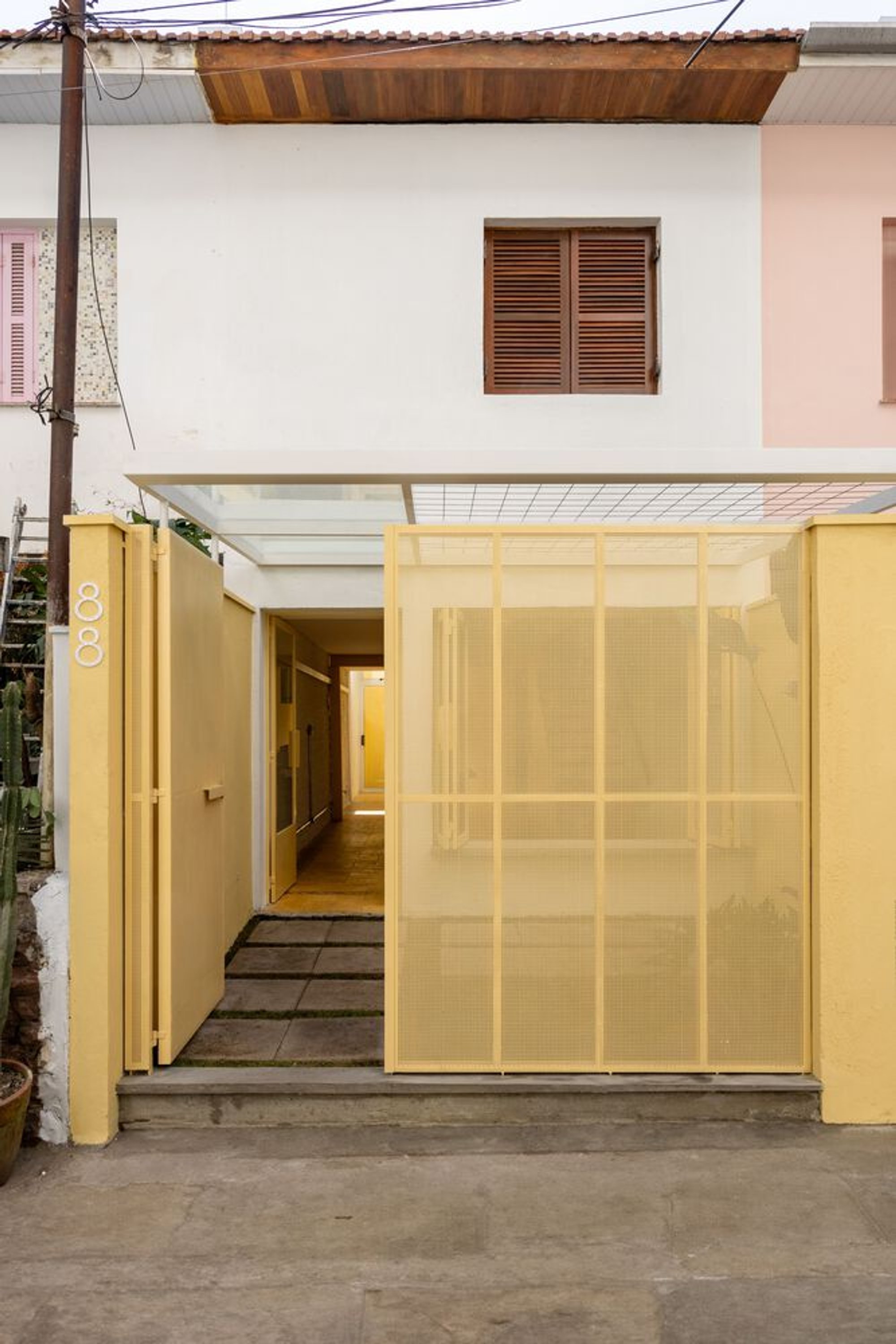 Pinheiros House: Harmonizing Heritage and Contemporary Living in São Paulo
