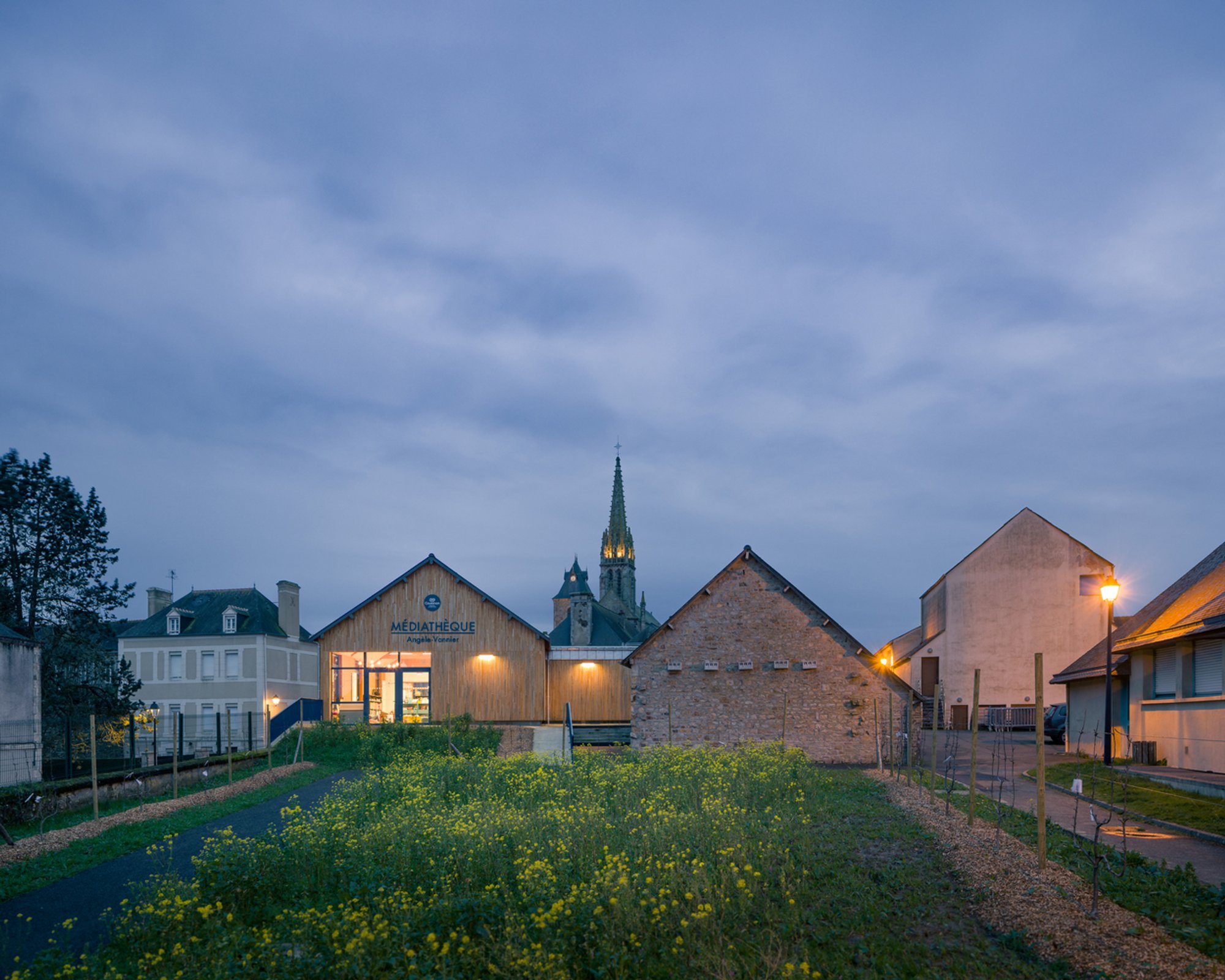 Media Library and Earth-Based Third Place by DEAR + Celeste Architecture