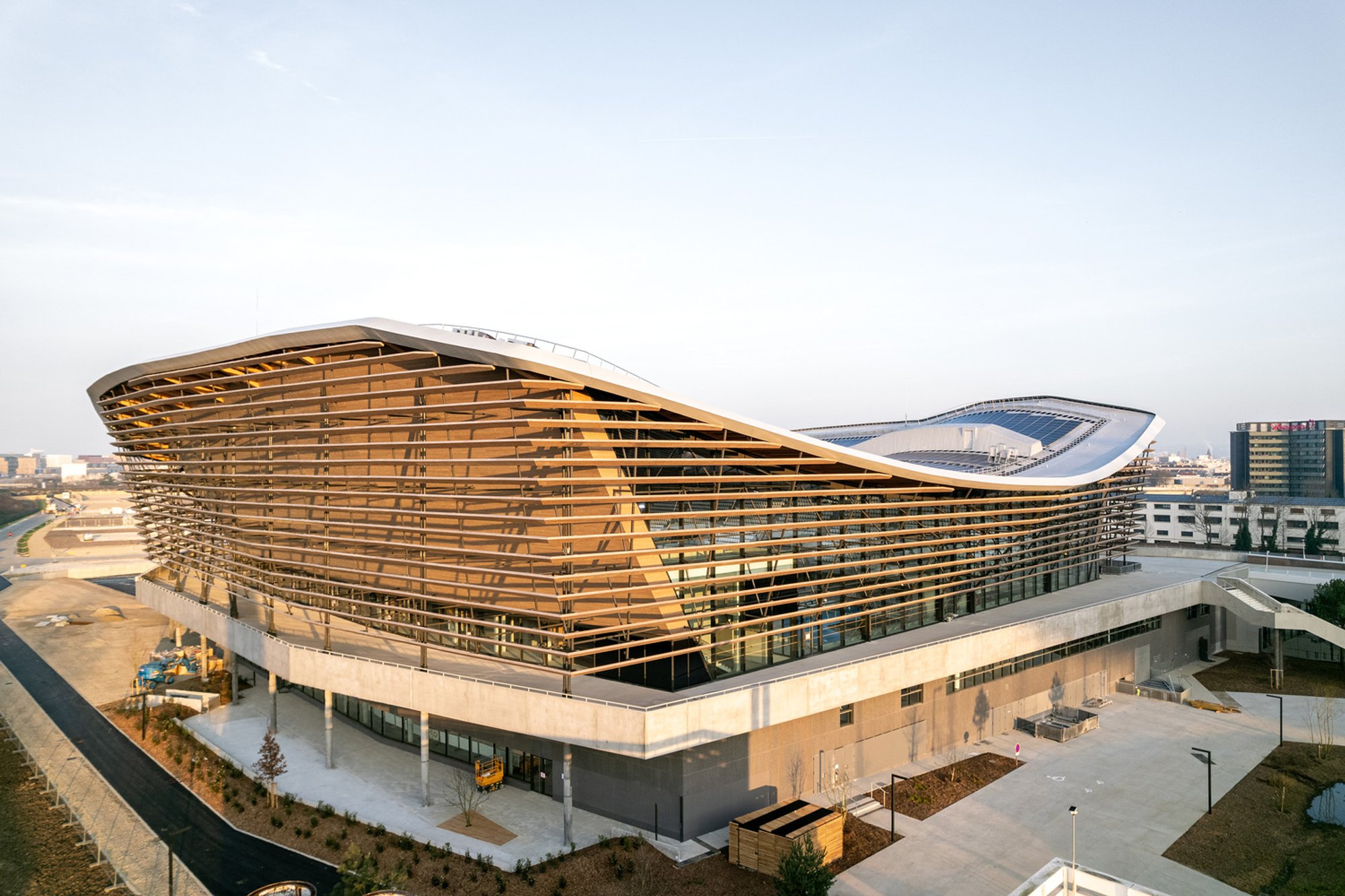 Aquatics Centre Paris by VenhoevenCS and Ateliers 2/3/4/: A Landmark of Sustainable Sports Architecture