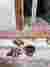 This architectural image showcases the construction of a brick threshold and facade detail. The desi
