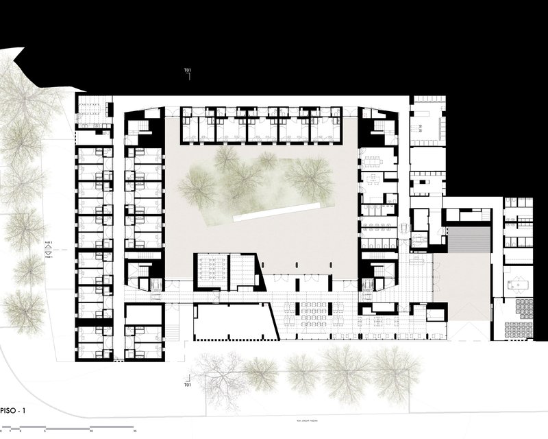 Ground floor plan drawing showing residential units arranged around a central courtyard with trees