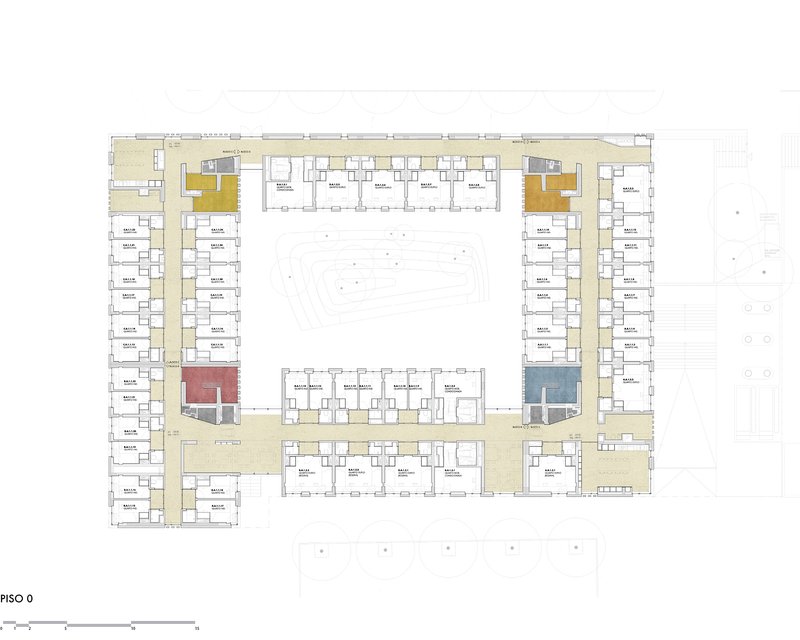 Floor plan drawing showing residential units with circulation corridors and color-coded communal spaces around a courtyard