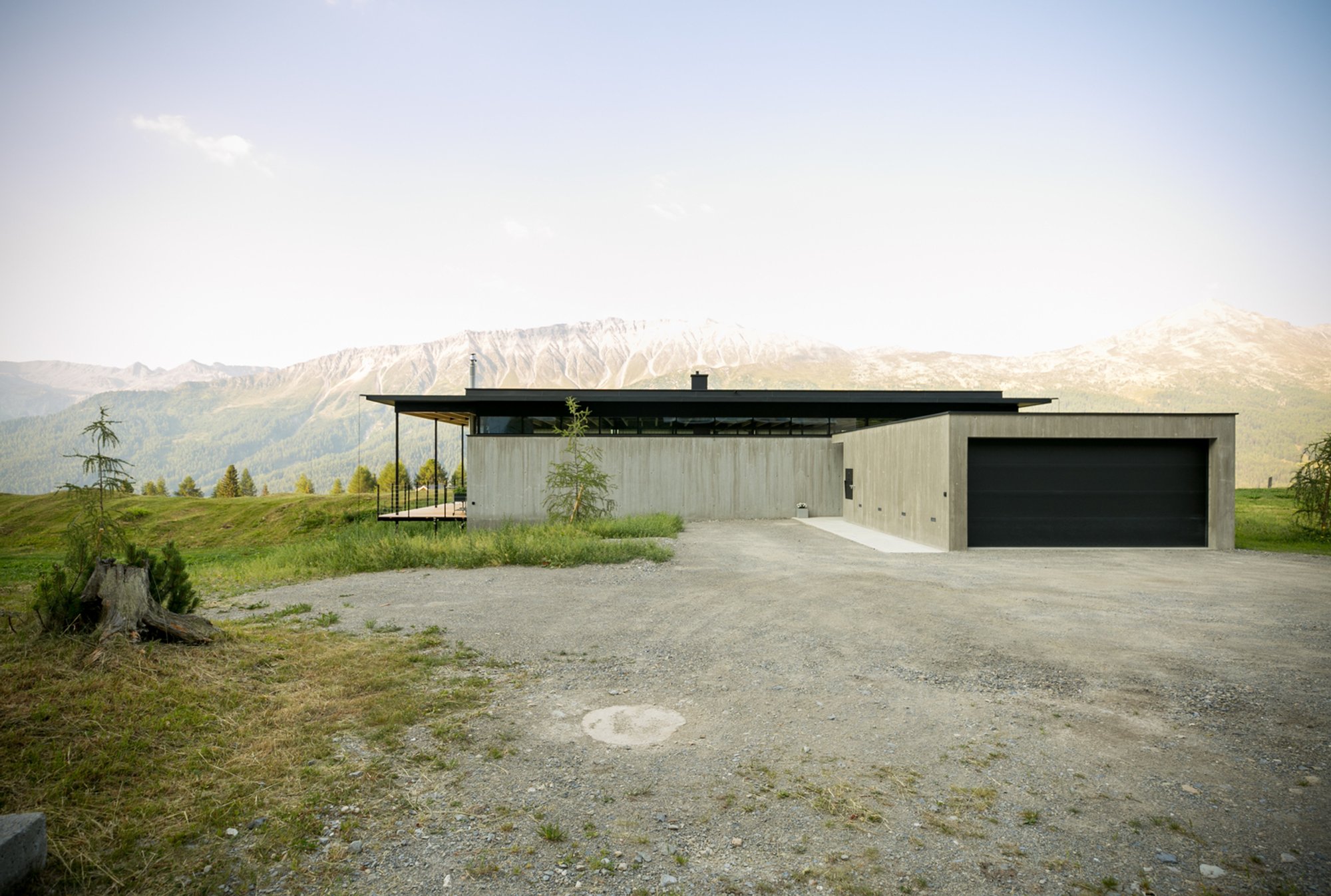 Fops House by Modunita Architects: A Minimalist Residential Design Blending Architecture and Landscape in Switzerland