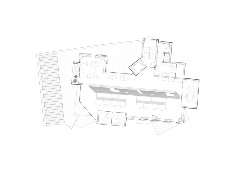 This architectural image presents a floor plan, likely for a combined office and residential space. The design incorporates an open floor plan with distinct zon