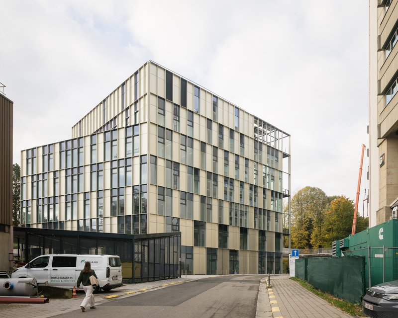 Corner view of the Learning and Innovation Center showing the chequered glass and panel facade