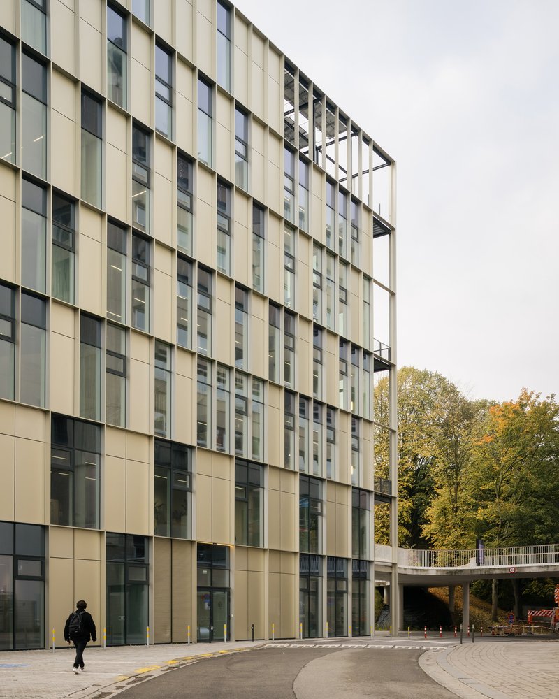 Glazed facade and a covered walkway connecting to a neighbouring campus building