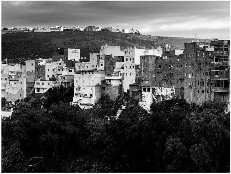 Adaptive reuse of marginal housing along the valley edge.