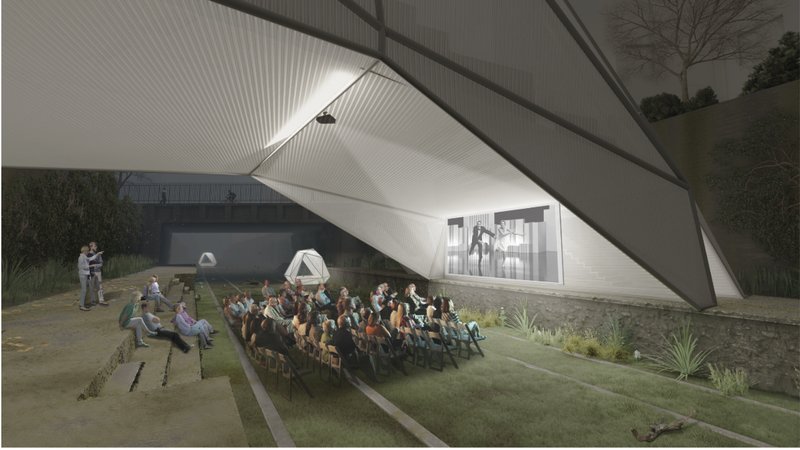 &nbsp; Outdoor cinema setup beneath the structure, activating the railway corridor as a cultural public space.
