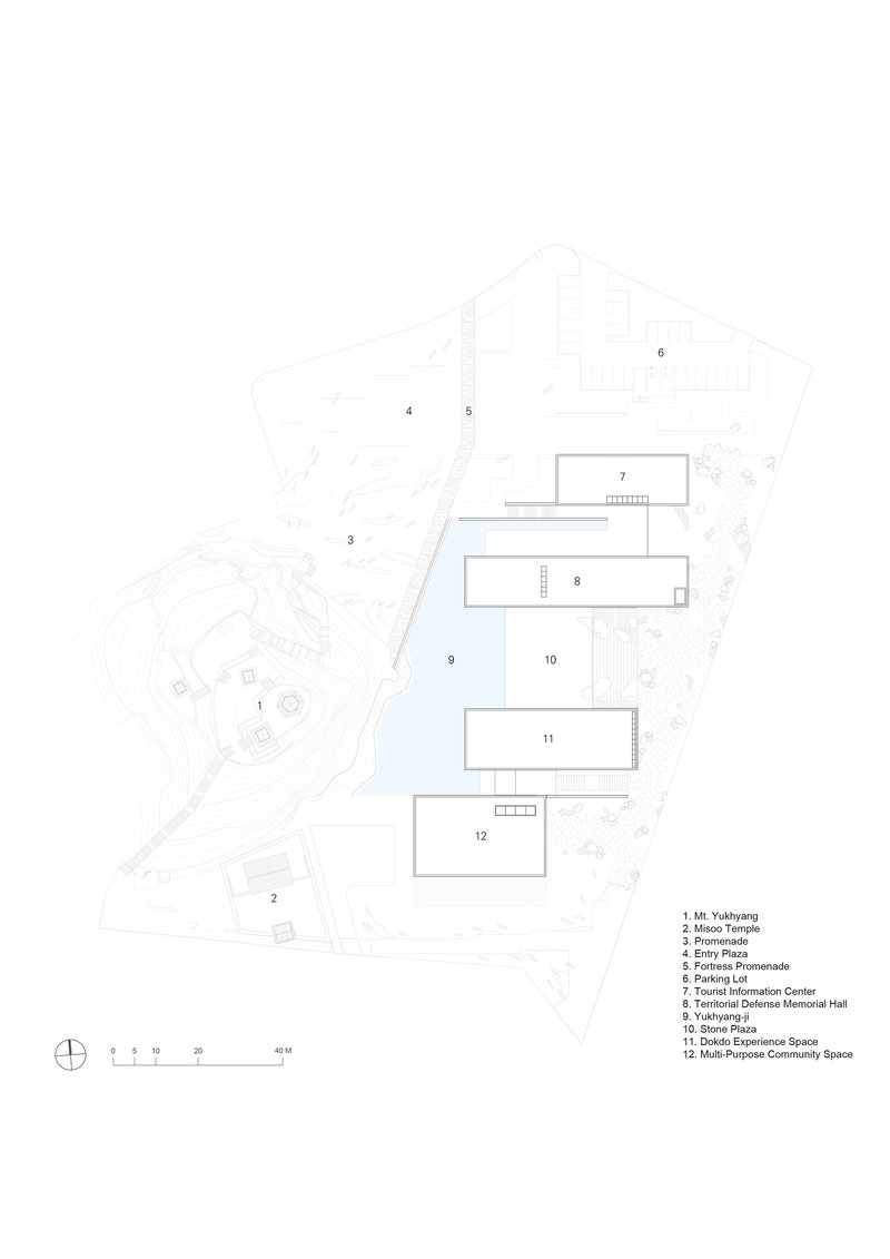 Site plan drawing depicting building volumes positioned along a sloping hillside with water feature