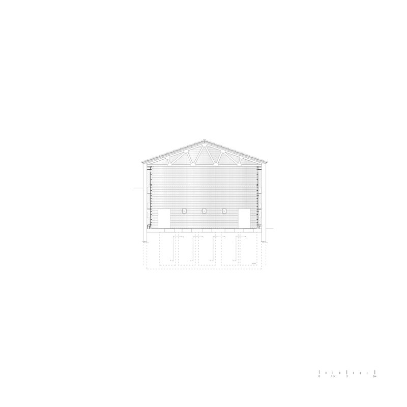 Section drawing showing the gabled roof structure with exposed trusses above a double-height space
