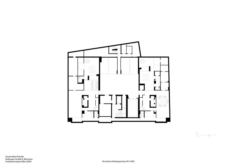 Floor plan drawing showing multiple residential units arranged around a central circulation core