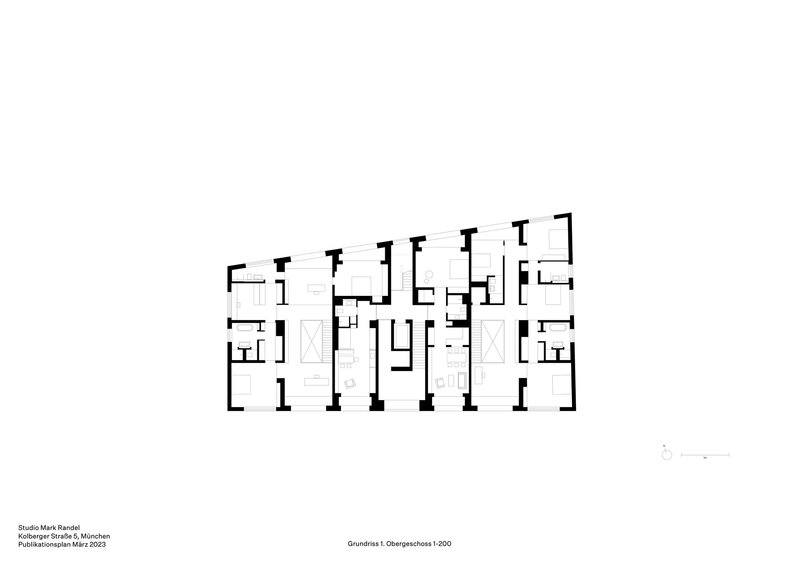 Floor plan drawing showing residential units with central circulation shafts and symmetrical layout