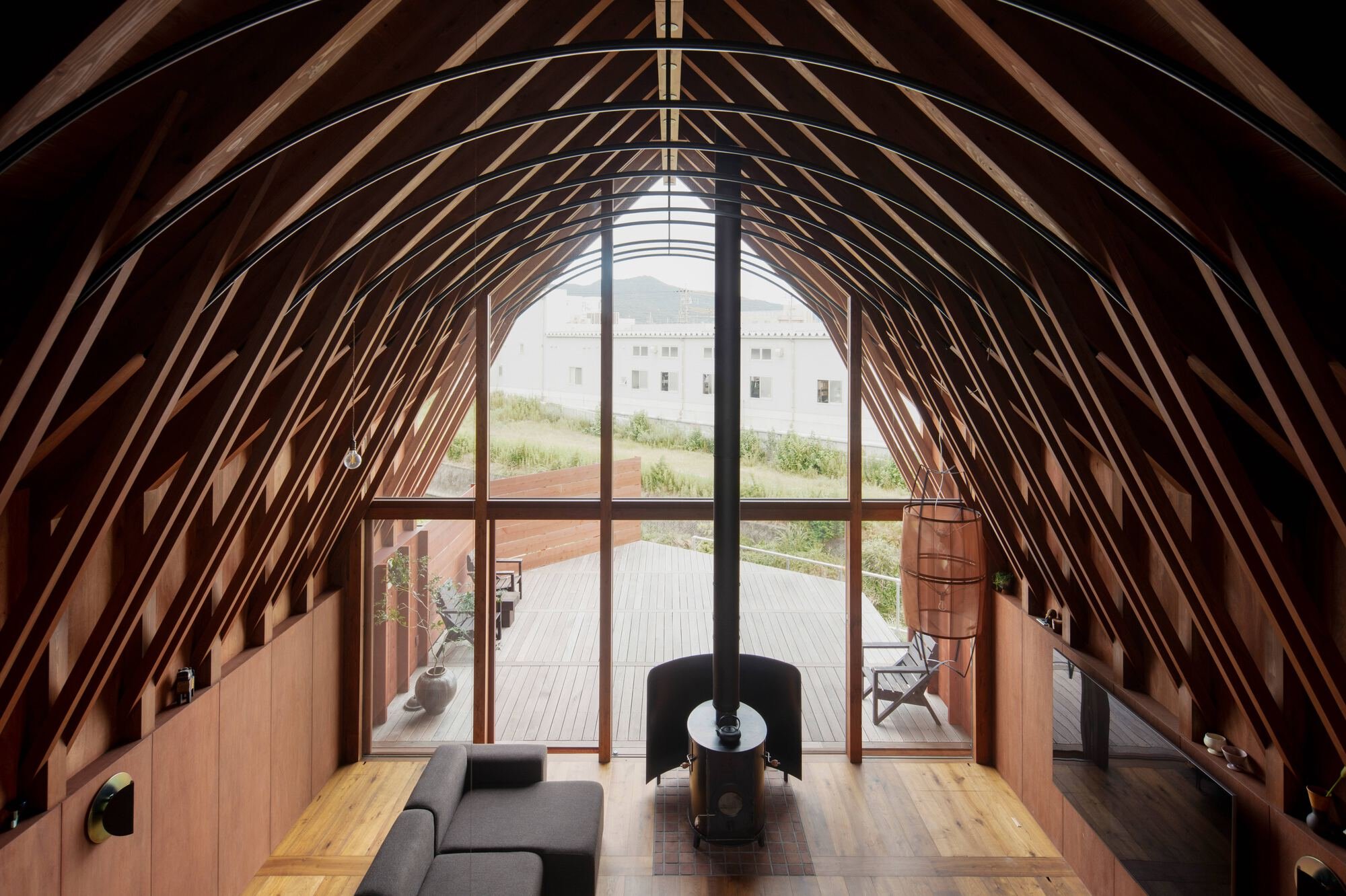A House of Two Barns on a Flag-Shaped Plot