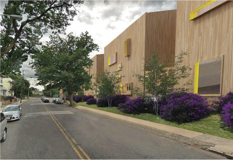 Street view of the Help Center, designed to integrate with the residential scale of Newark while creating a welcoming civic presence.