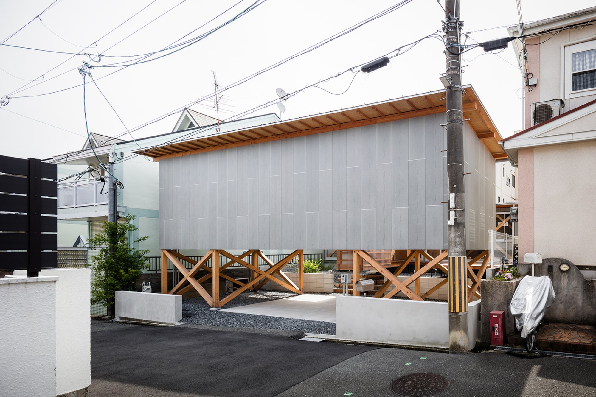 House in Gakuenmae by KKAA YTAA: Compact Living Connected with Nature in Nara, Japan
