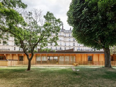 Wood and Rammed Earth Nursery by Atelier Régis Roudil Architectes – Sustainable Childcare Design in Paris