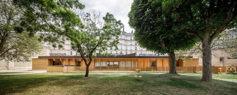 Wood and Rammed Earth Nursery by Atelier Régis Roudil Architectes – Sustainable Childcare Design in Paris