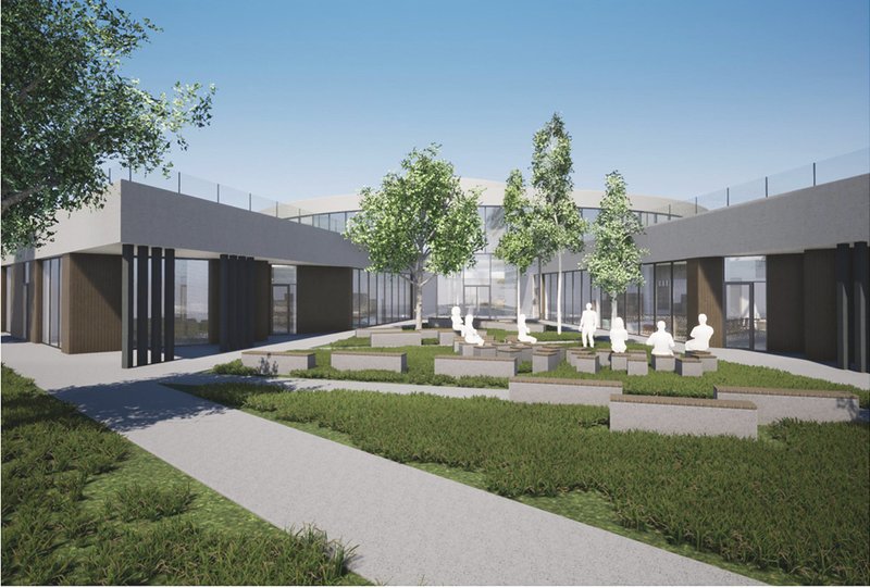 Outdoor courtyard learning space promoting interaction, nature integration, and experiential education within school campus design.