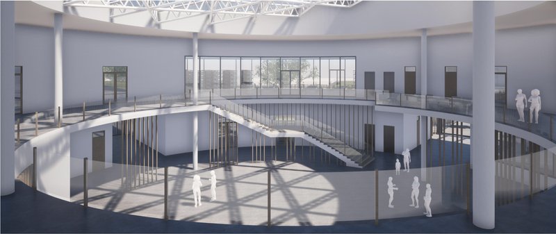 Central atrium with circular geometry enabling visual connectivity, social interaction, and dynamic learning experiences.