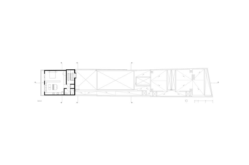 Roof plan drawing indicating skylight positions and structural framing across the elongated building footprint