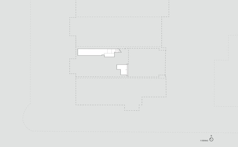Floor plan drawing showing a small extension with triangular projection on an existing building footprint