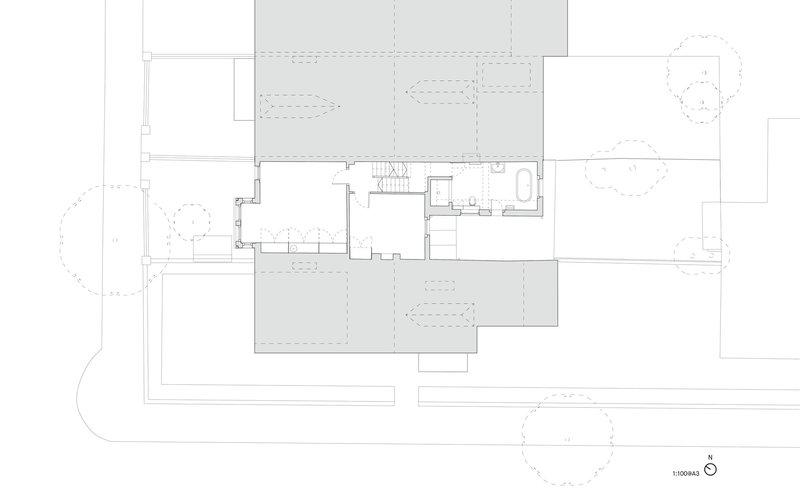 Floor plan drawing showing upper level with staircase, bathroom and bedroom layout