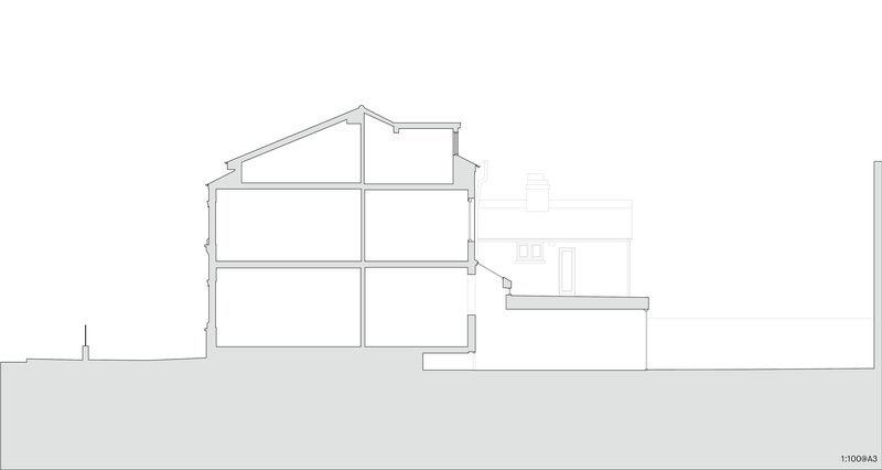 Section drawing showing the three-story main volume with pitched roof and single-story extension