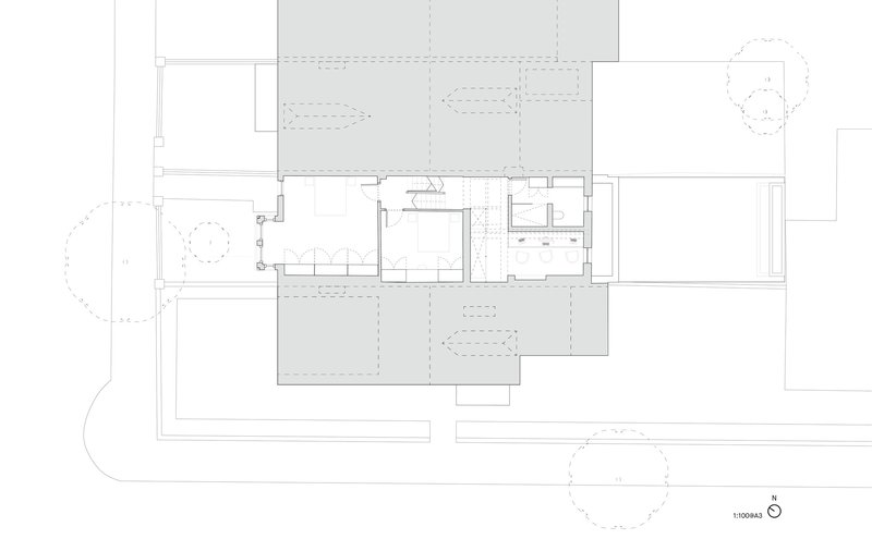 Floor plan drawing showing bedroom and bathroom volumes inserted within the central living zone