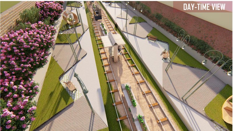 Aerial view reveals adaptive urban design layering programs along historic tracks.