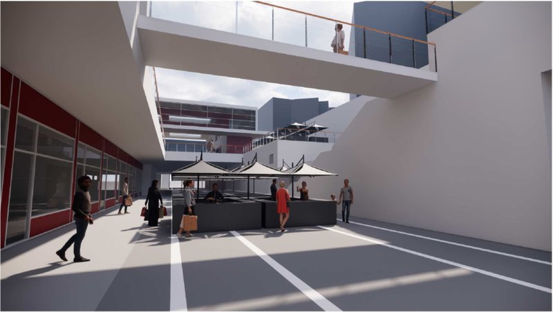 Market space under the canopy fosters social interaction and everyday urban life.