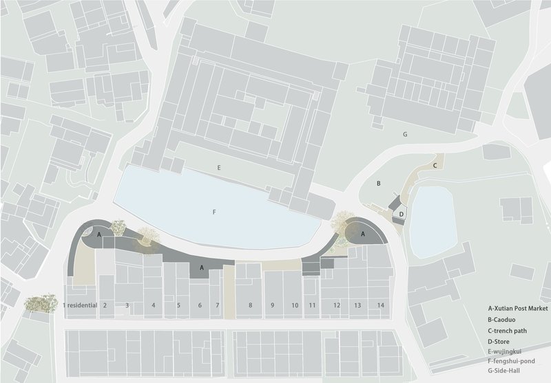 Site plan showing a curved building anchoring residential blocks and a pond at the urban edge
