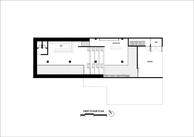 First floor plan drawing showing reception area, bar, and parking zones with central staircase