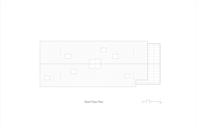 Roof plan drawing showing multiple skylight openings on a rectangular volume with exterior stairs