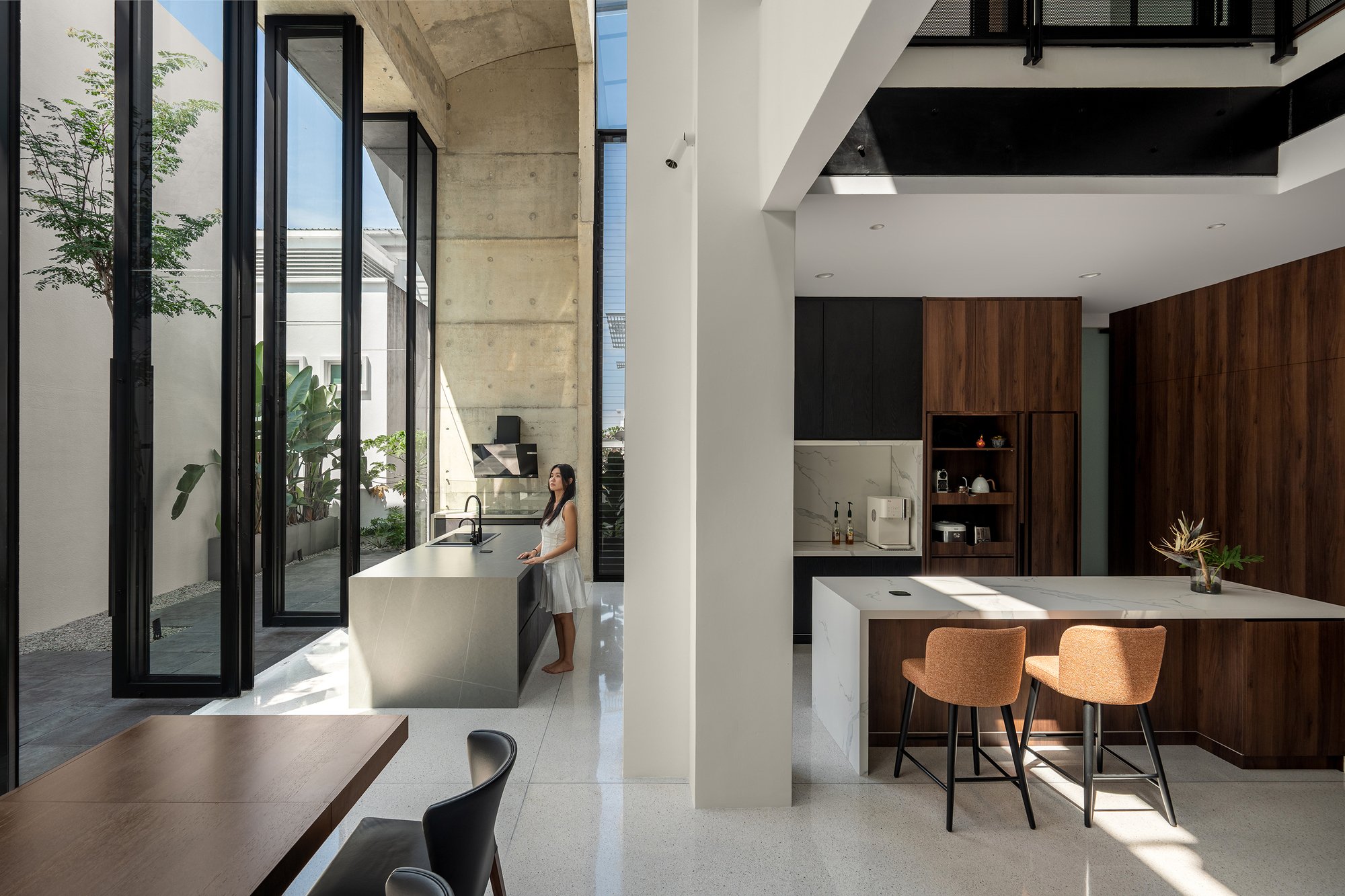 Core Design Workshop Carves Courtyards into a Zero-Lot Bungalow in Kuala Lumpur