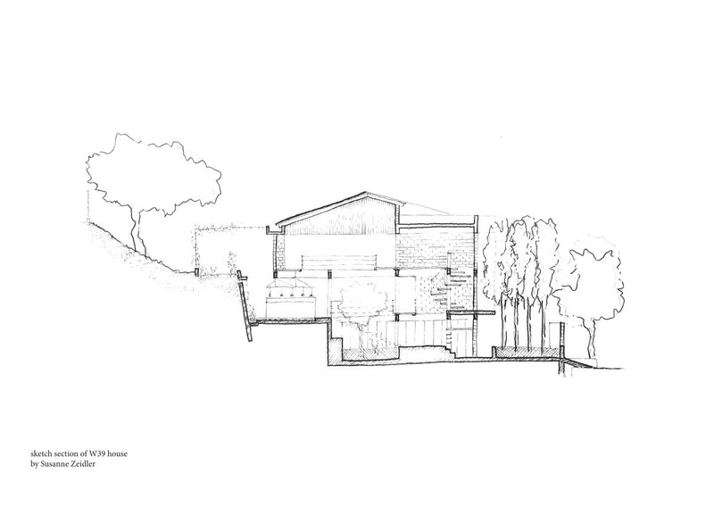 Section drawing showing a multi-level residence with sloped roofs and trees flanking both sides