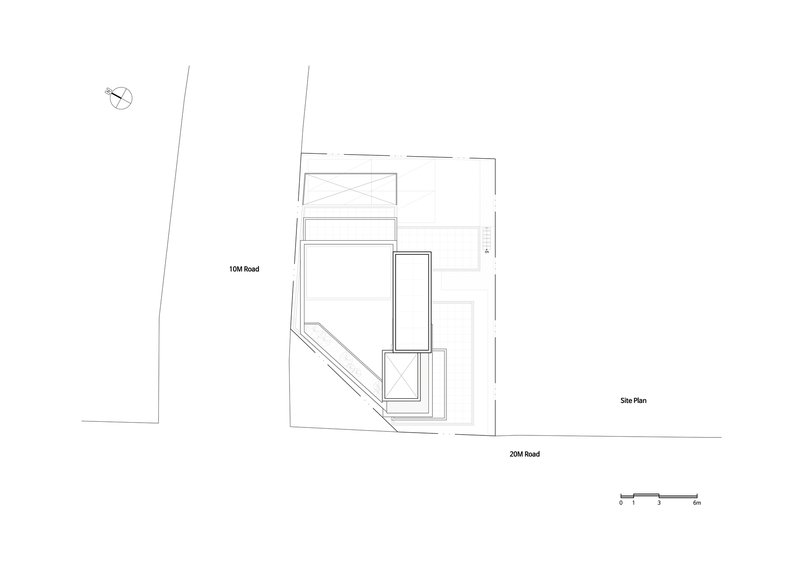 Site plan drawing showing the angled footprint between two intersecting roads