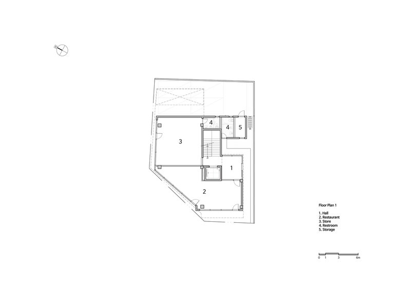 First floor plan drawing showing hall, restaurant, and restroom spaces around central stair