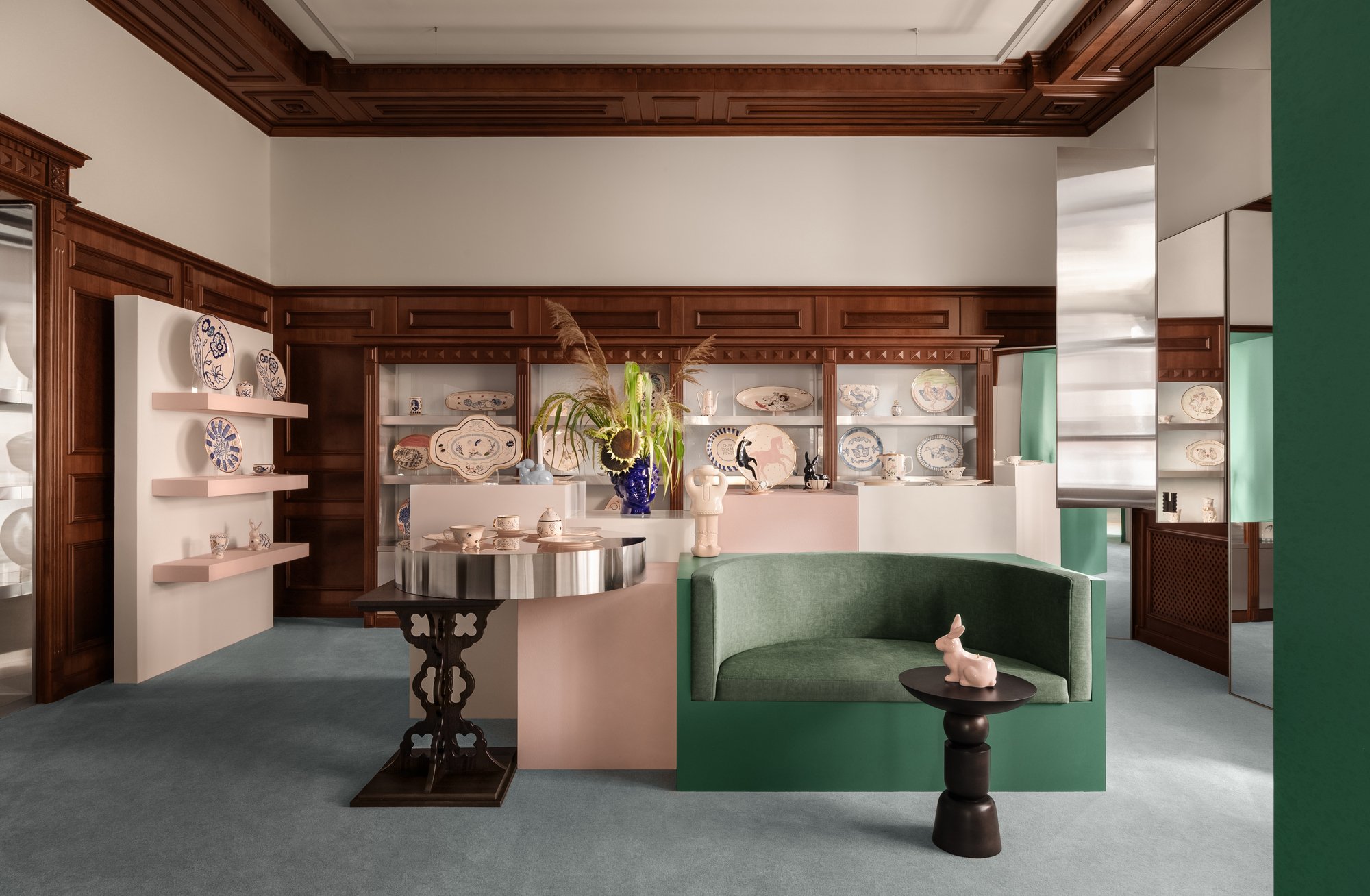 Temp Project Hides a VIP Fitting Room Inside a Mahogany Cabinet in This Kyiv Showroom