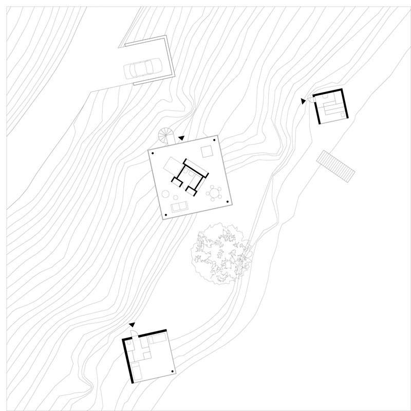 Site plan drawing showing three structures and contour lines across a sloping waterfront terrain
