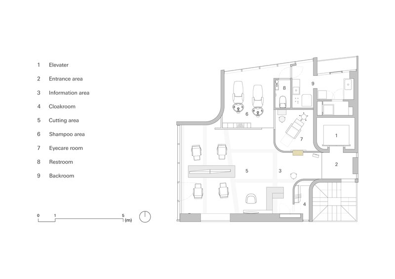 Floor plan drawing showing salon layout with cutting area, shampoo stations, and curved entrance wall