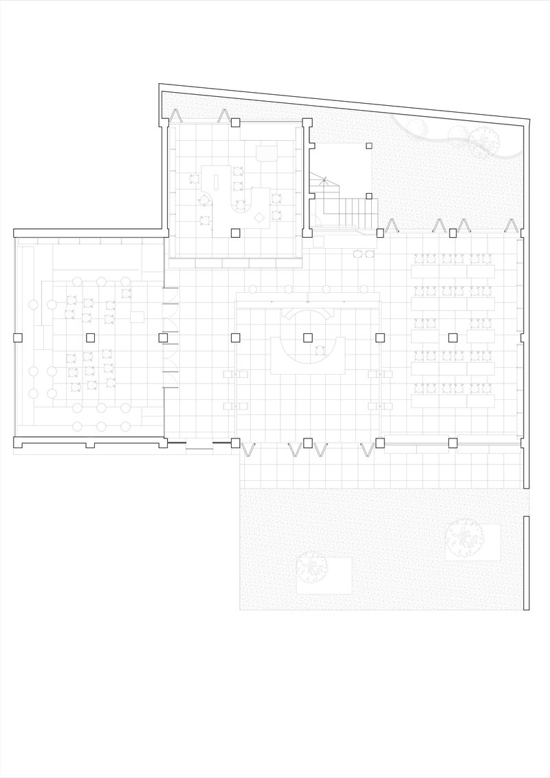 Floor plan drawing depicting dining areas, workstations, and outdoor courtyard with tree symbols